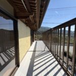 【中古物件】山並みを望む開放感と、日本家屋ならではの趣。 和のぬくもりを残して再生した、リフォーム済み5LDK。